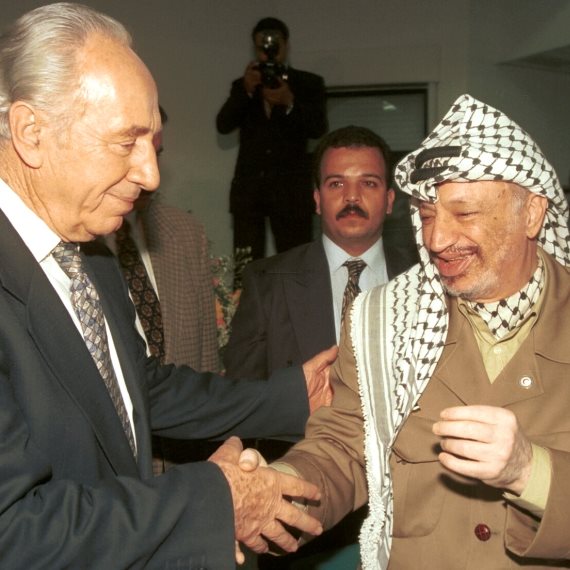 יאסר ערפאת ושמעון פרס